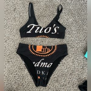 Tito’s bathing suit